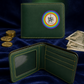 A dark green leather bifold wallet shown closed and open on a dark blue velvet background, surrounded by decorative coins and banknotes. The closed wallet features a circular rainbow emblem with a stylized monogram, and the open wallet reveals interior card slots and ID window.