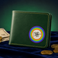 A dark green leather wallet with yellow stitching and a circular rainbow St. Patrick's Day logo, displayed on a dark blue velvet surface with coins and paper money.