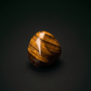 Tiger's eye stone on a dark background