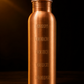 Copper water bottle with motivational phrases on a dark background