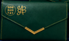 A promotional collage showing several dark green wallet and envelope-style wallet products with gold embroidery and coin graphics, under the text 'NEW ARRIVALS WEALTH WALLET COLLECTION' and 'MILIONAIRE'S MIND HUB'.