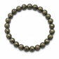 Pyrite beaded bracelet on a white background