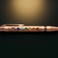 Luxury pen with gemstones on a dark background