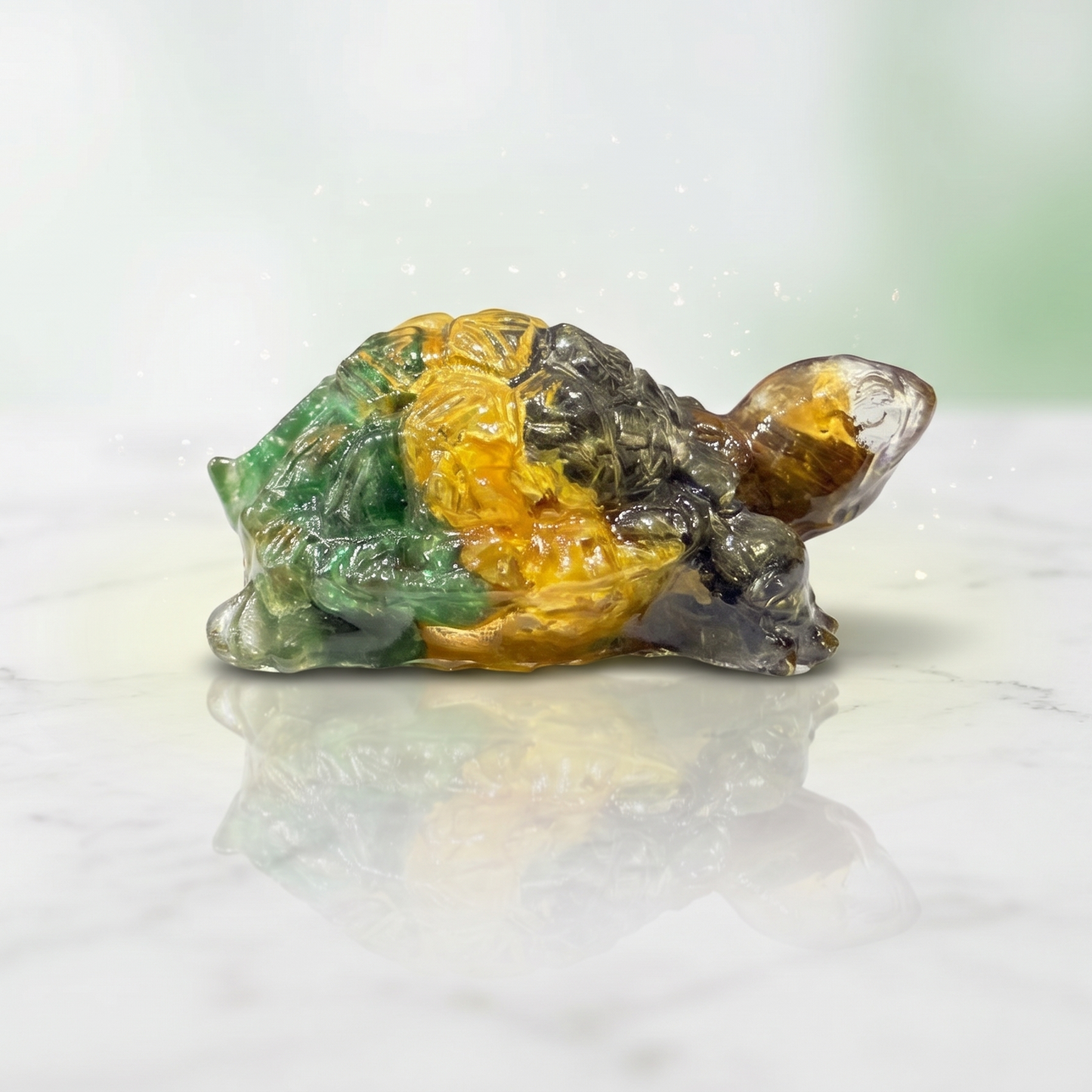 Mineral specimen with green and yellow colors on a white background