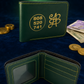 A dark green leather bi-fold wallet shown both closed and open on a dark blue velvet surface, with gold contrast stitching, gold printed numbers and monogram on the closed view, and card slots and an ID window visible in the open view. Coins and paper currency are placed around it as styling props.